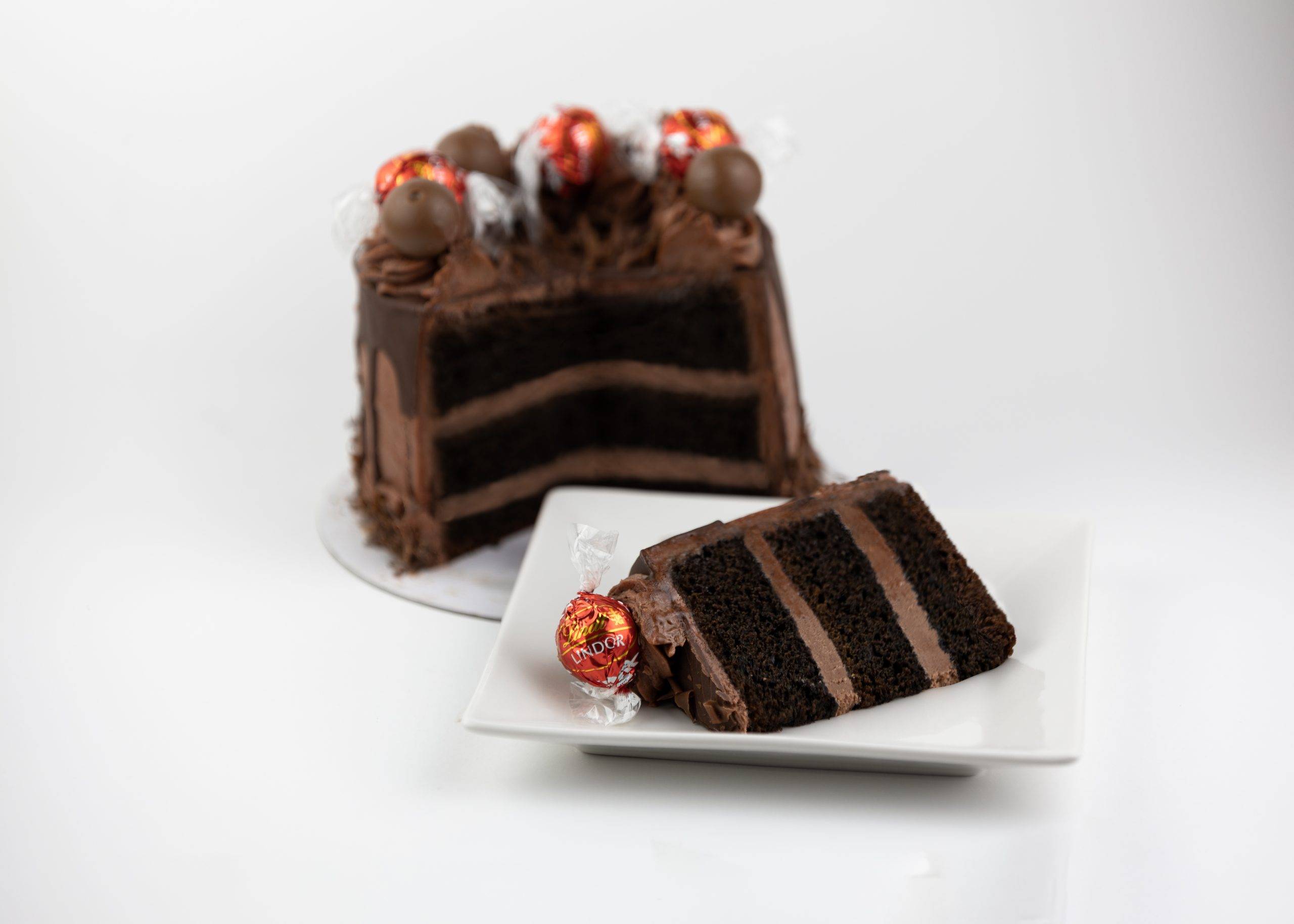 The Lindt Deluxe Chocolate Cake Desserts Delivered Bakery